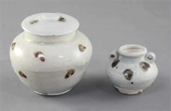 A Chinese Qiangbai iron spot covered jarlet and a smaller two handled jarlet, Yuan dynasty, 14th century, height 8cm and 4.2cm